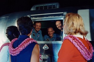 The Apollo 11 crewmembers are greeted by their wives in Houston.