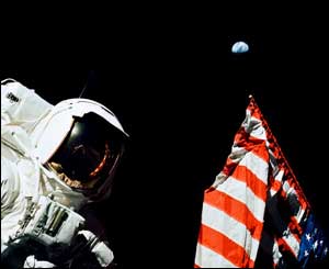 Harrison "Jack" Schmitt on the moon, December 1972, with Earth in the background.