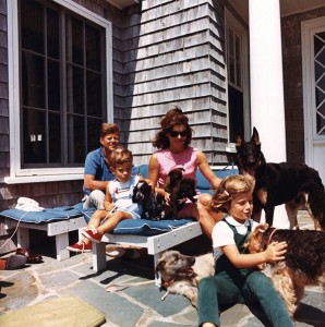 Two of Strelka's grand-puppies, in Mrs. Kennedy's lap, August 1963. Photograph by Cecil Stoughton, White House, in the John Fitzgerald Kennedy Presidential Library and Museum, Boston.
