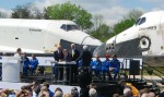 NASA and Smithsonian officials sign the document that transfers Discovery to the National Air and Space Museum.